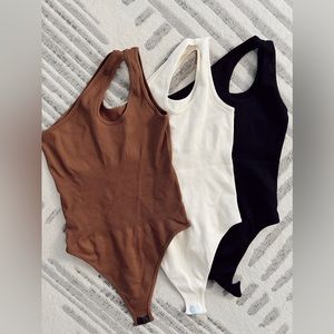 Three pack ribbed bodysuits
